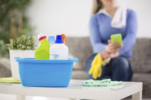 Technician treating stains during mattress cleaning in Knightsbridge